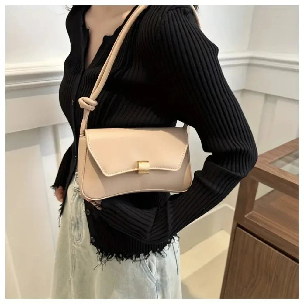 Eine Umhängetasche Mit Vintage-Eleganz Und Moderner Funktionalität