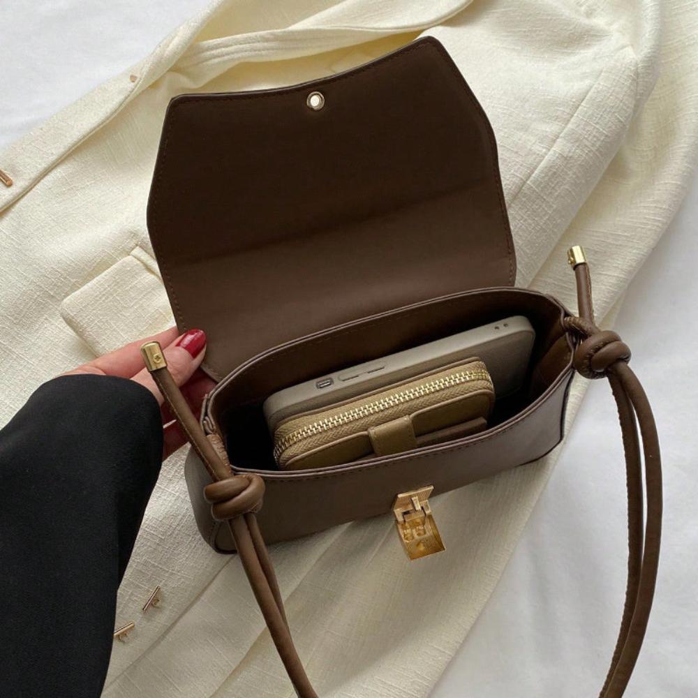 Eine Umhängetasche Mit Vintage-Eleganz Und Moderner Funktionalität