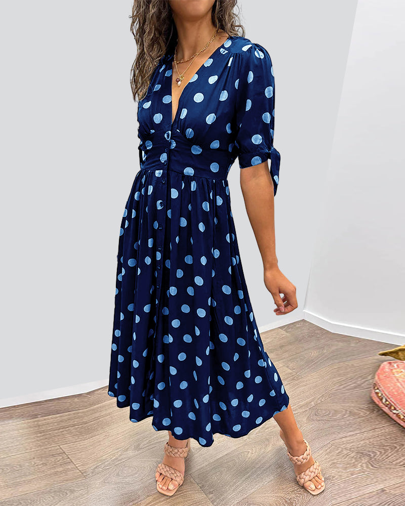 Kleid Mit Tiefem V-Ausschnitt Und Tupfenmuster