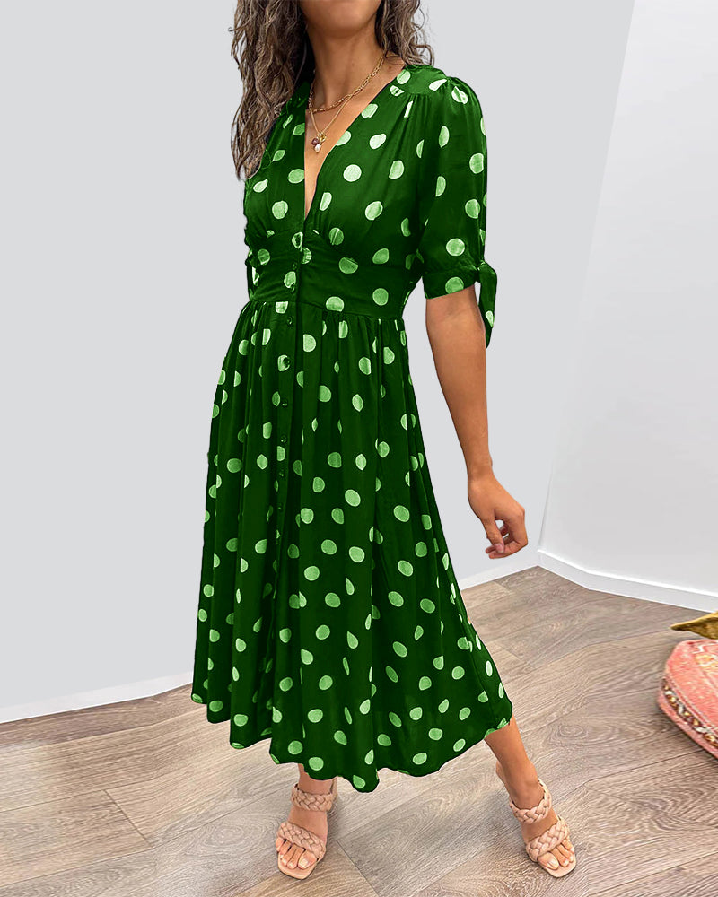 Kleid Mit Tiefem V-Ausschnitt Und Tupfenmuster