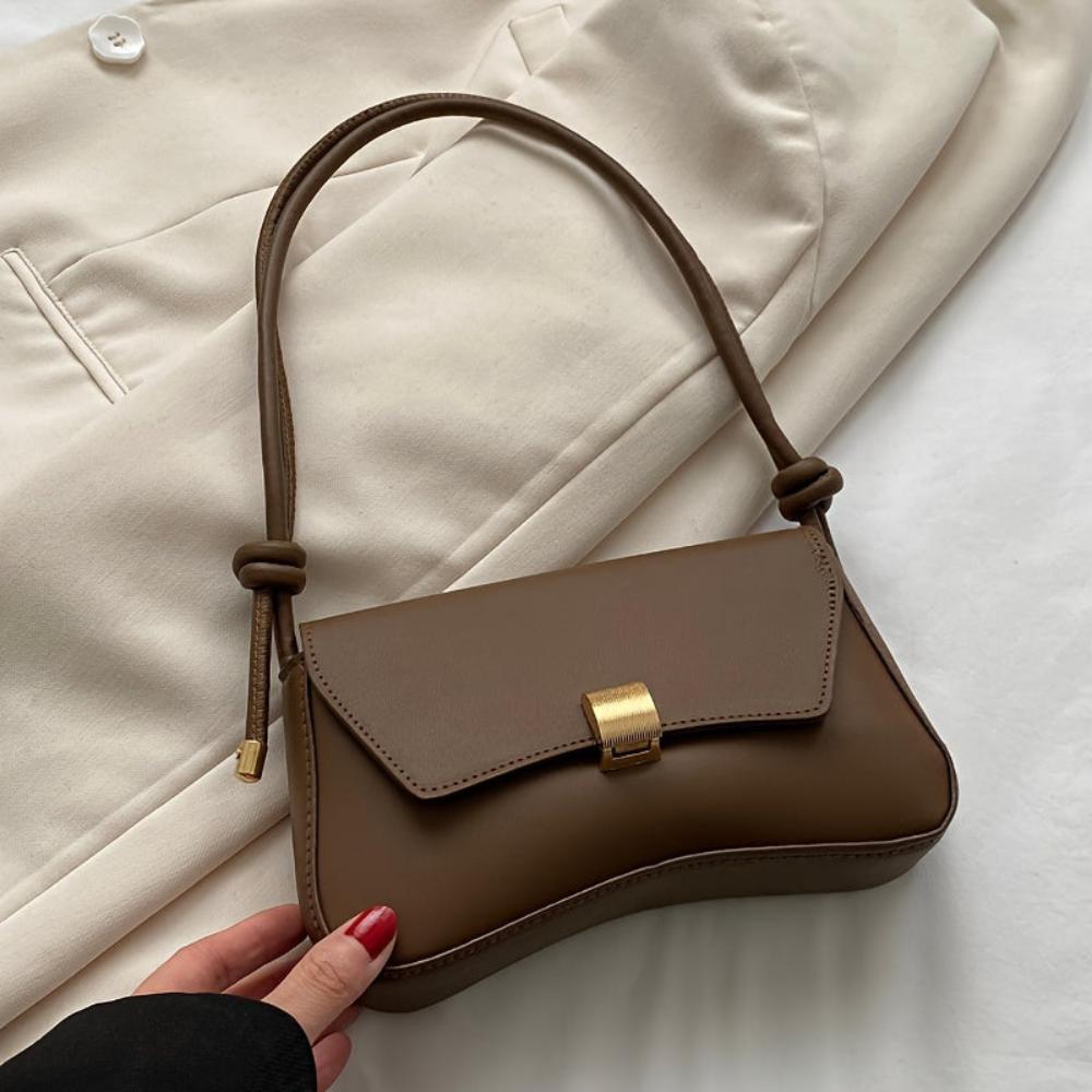 Eine Umhängetasche Mit Vintage-Eleganz Und Moderner Funktionalität