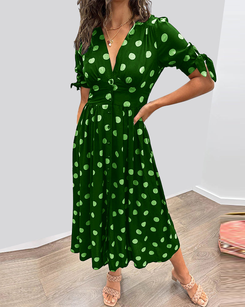 Kleid Mit Tiefem V-Ausschnitt Und Tupfenmuster