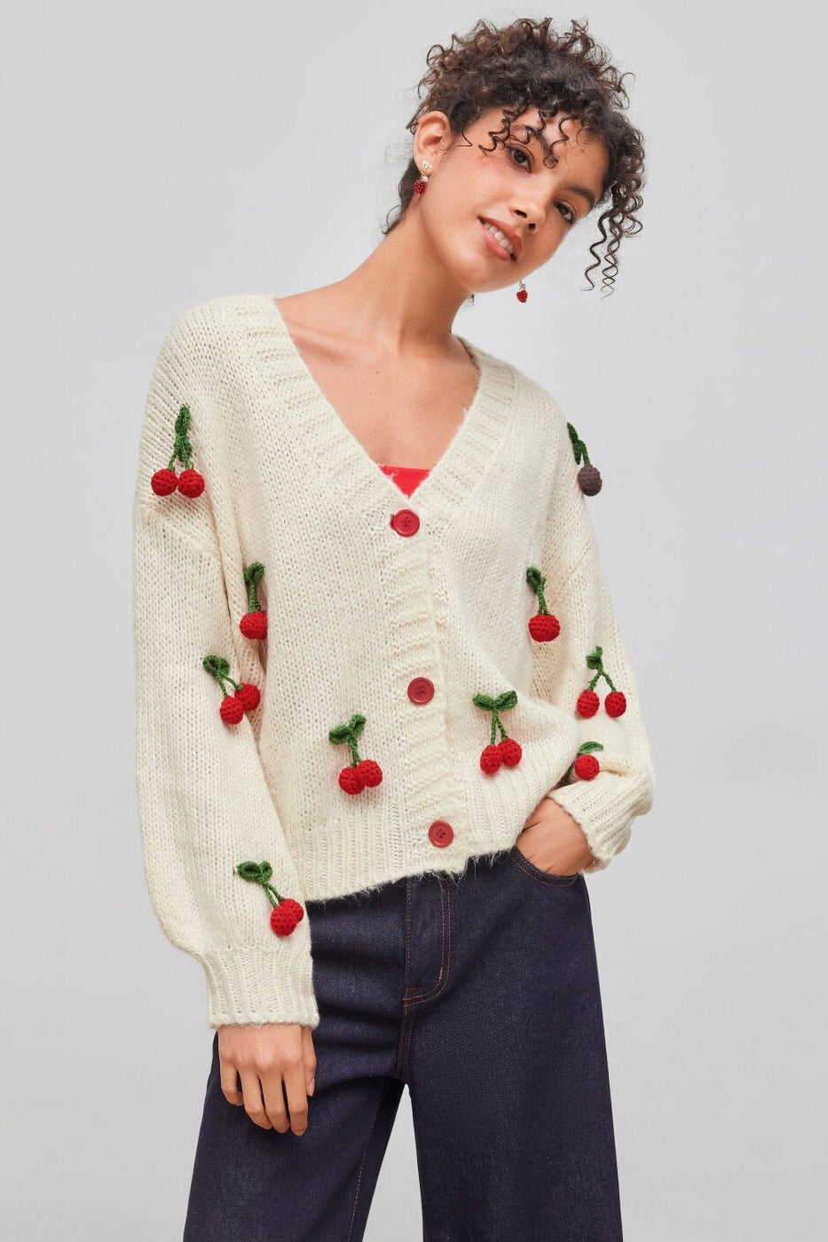 Elegante Strickjacke Mit Kirschmuster