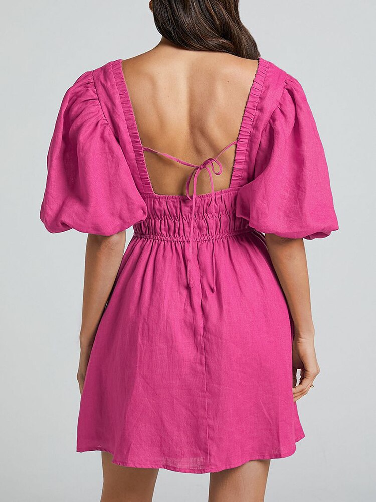 Rosa Minikleid Mit V-Ausschnitt Und Kurzen Ärmeln