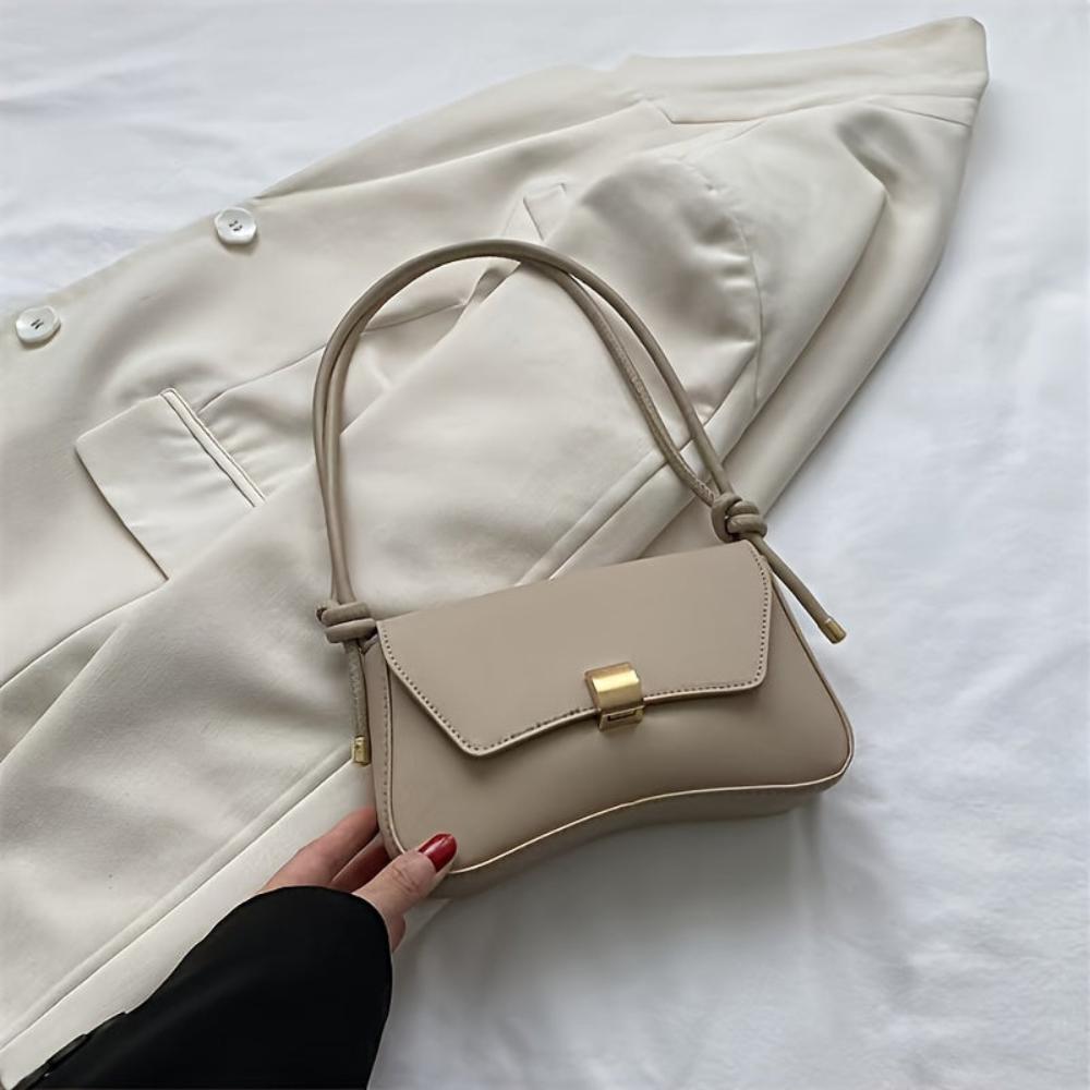 Eine Umhängetasche Mit Vintage-Eleganz Und Moderner Funktionalität