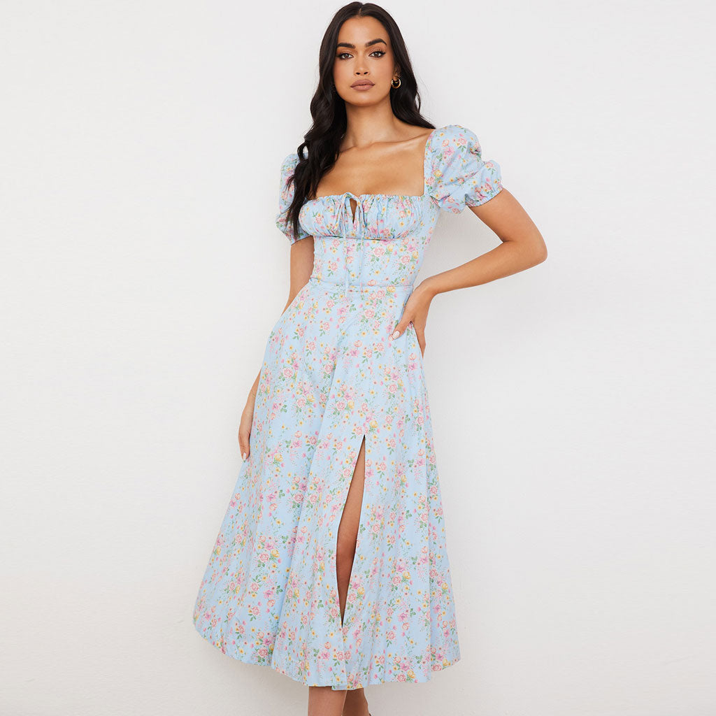 Stilvolles Hellblaues Maxikleid Mit Gänseblümchenmuster, Puffärmeln Und Hohem Schlitz