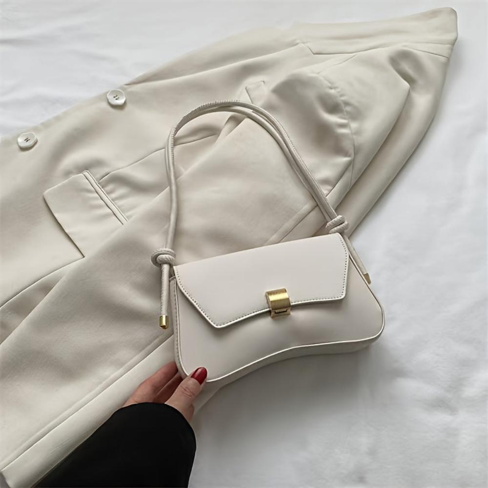 Eine Umhängetasche Mit Vintage-Eleganz Und Moderner Funktionalität