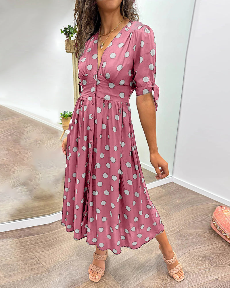 Kleid Mit Tiefem V-Ausschnitt Und Tupfenmuster