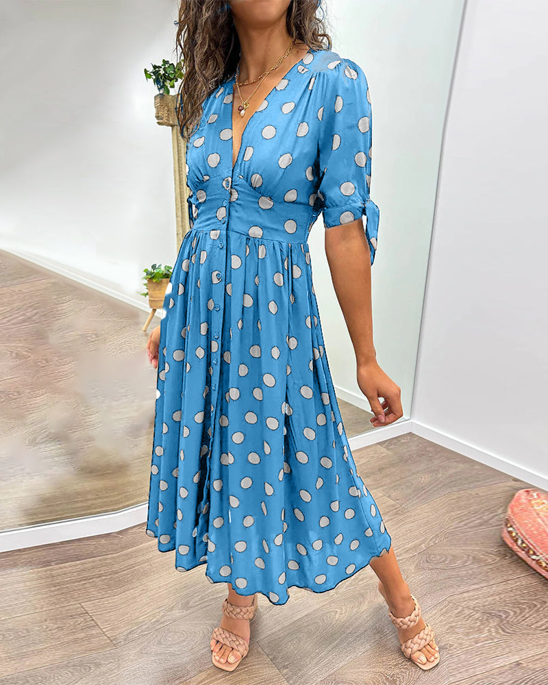 Kleid Mit Tiefem V-Ausschnitt Und Tupfenmuster