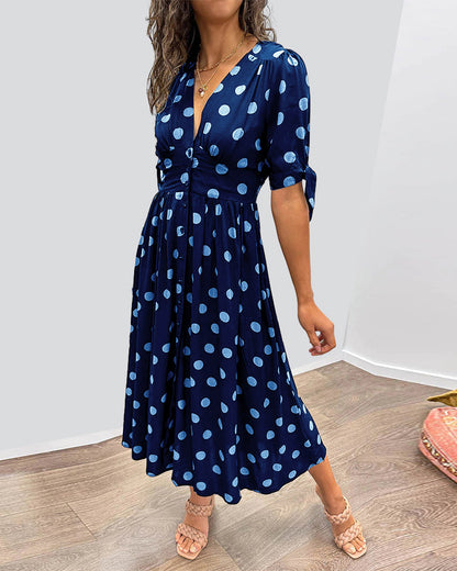 Kleid Mit Tiefem V-Ausschnitt Und Tupfenmuster