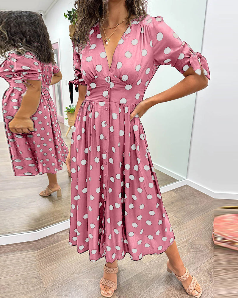 Kleid Mit Tiefem V-Ausschnitt Und Tupfenmuster