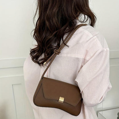 Eine Umhängetasche Mit Vintage-Eleganz Und Moderner Funktionalität