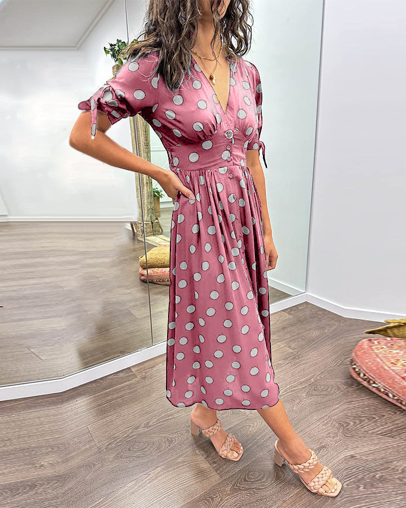 Kleid Mit Tiefem V-Ausschnitt Und Tupfenmuster