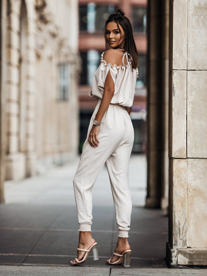 Stylischer Design-Jumpsuit Mit Schulterfreiem Ausschnitt