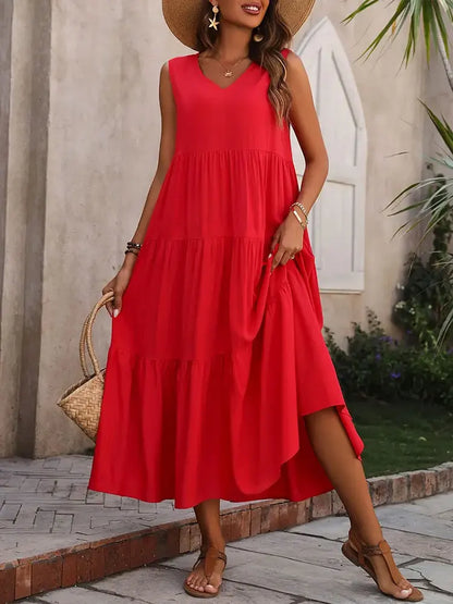 Langes Kleid Mit V-Ausschnitt Und Lockerem Schnitt Und Rüschen