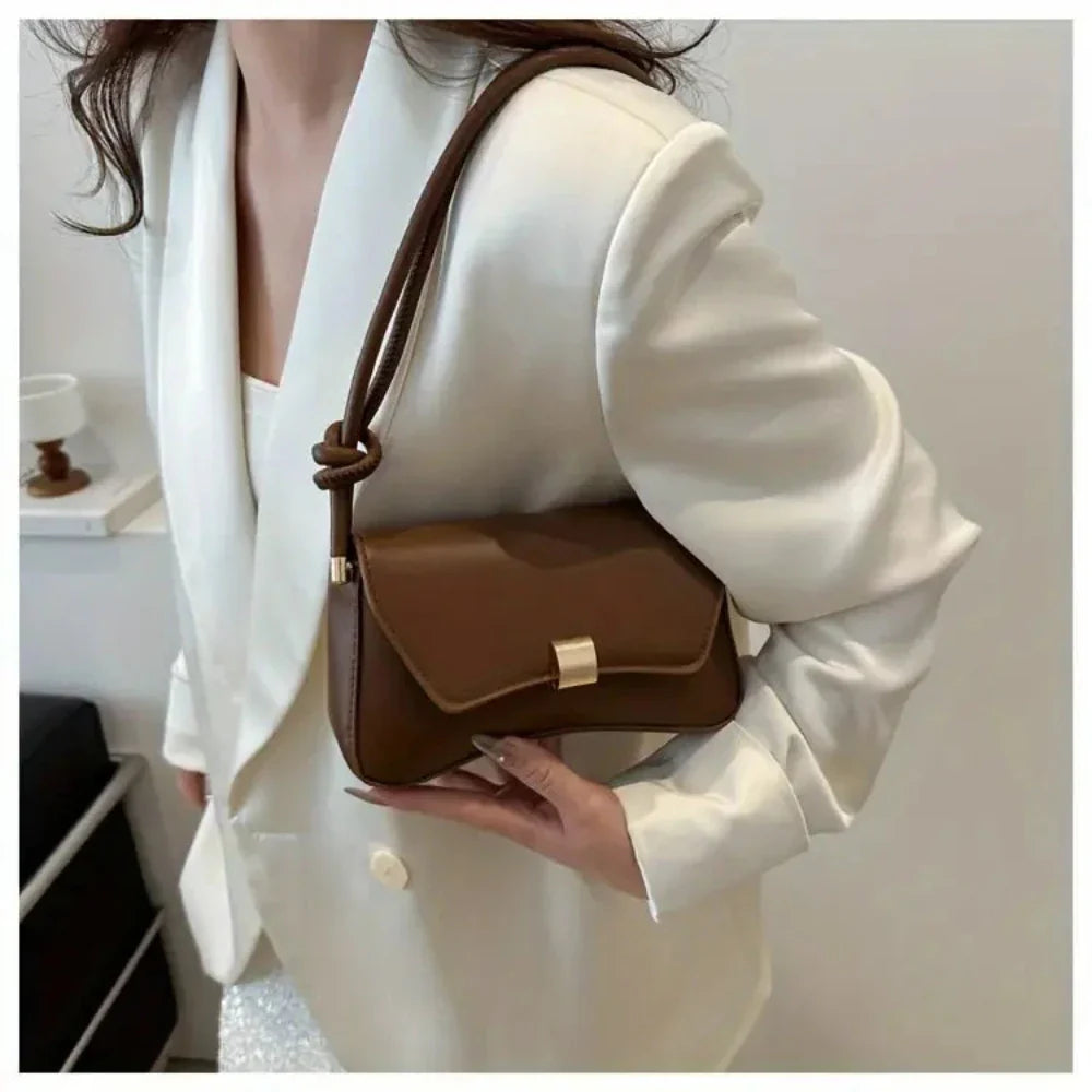 Eine Umhängetasche Mit Vintage-Eleganz Und Moderner Funktionalität