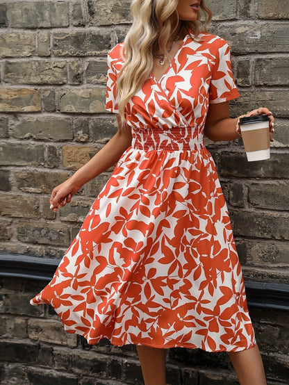 Kleid Mit Wickelkragen Und Blumenmuster