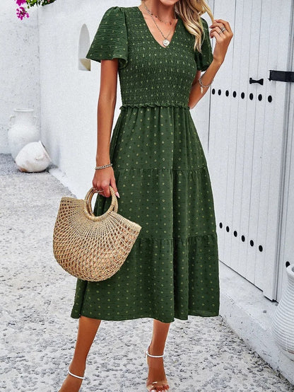 Elegantes Gemustertes Midikleid Mit V-Ausschnitt