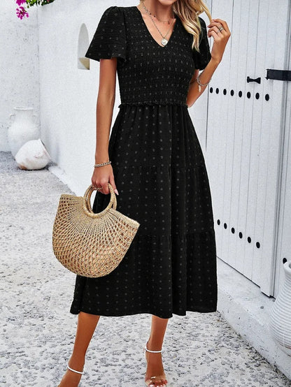 Elegantes Gemustertes Midikleid Mit V-Ausschnitt
