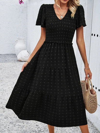 Elegantes Gemustertes Midikleid Mit V-Ausschnitt