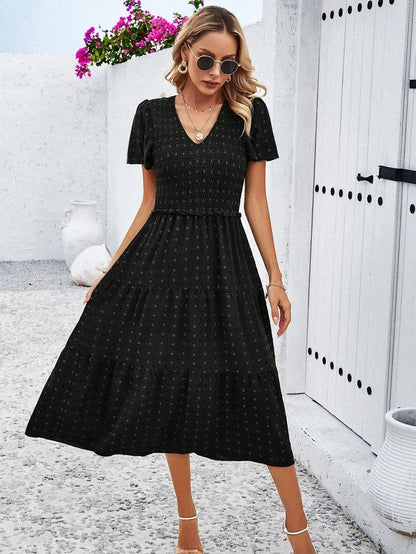 Elegantes Gemustertes Midikleid Mit V-Ausschnitt