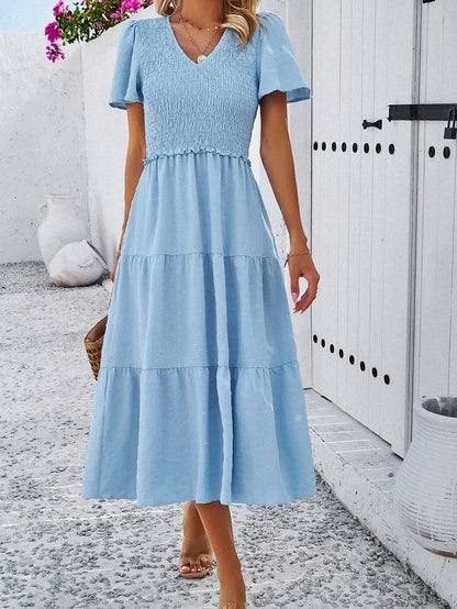 Elegantes Gemustertes Midikleid Mit V-Ausschnitt