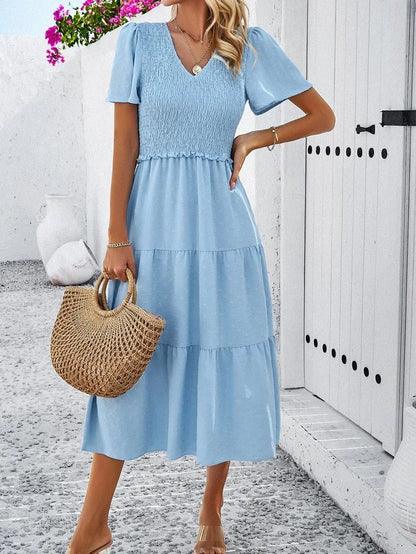 Elegantes Gemustertes Midikleid Mit V-Ausschnitt