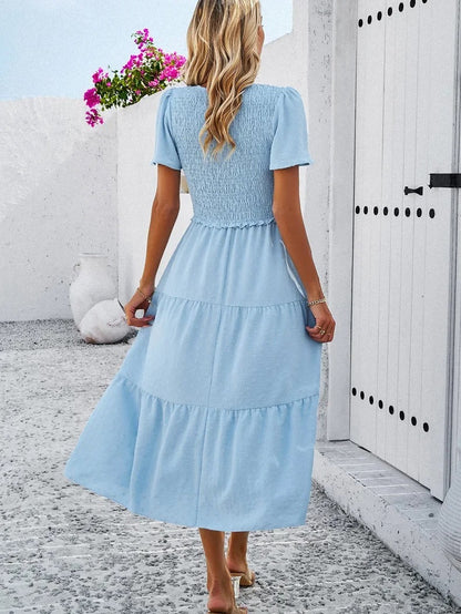Elegantes Gemustertes Midikleid Mit V-Ausschnitt