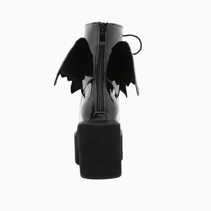 Schwarze Plateaustiefel Mit Klobigem Absatz, Reißverschluss Und Verspielten Flügeln